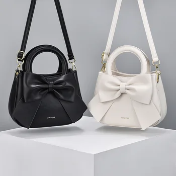 2023 Нова ръчна чанта за рамо Bowknot за дизайн на женското малцинство Луксозно свежо сладко момиче Фън Шуй кофа чанта за жени