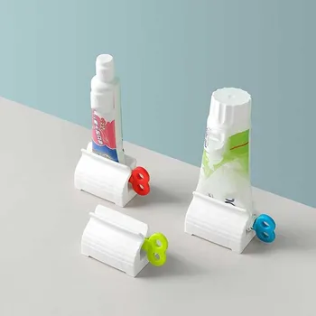 1Pcs Нов Дом Пластмасова паста за зъби Squeezer Tube Easy Dispenser Rolling Holder Баня Доставка Аксесоари за почистване на зъби