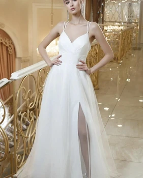 Зашеметяваща сватбена рокля Спагети каишка A-line страна цепка етаж дължина обратно без ръкави булчински рокли персонализиране на мерки халат De